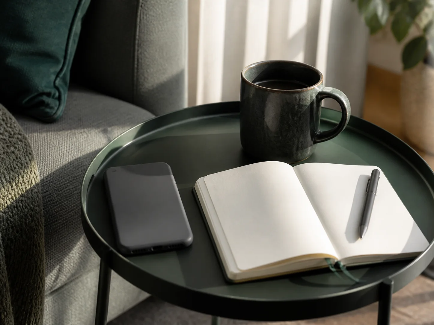 Phone and notebook prepared for a reflective call